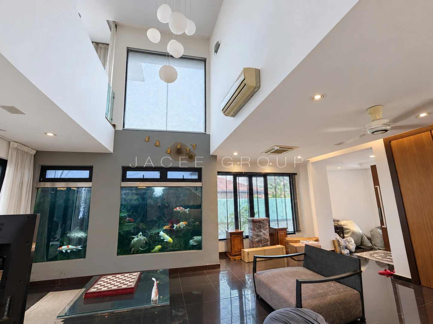 Double Height Living Hall at the Damansara Heights modern bungalow