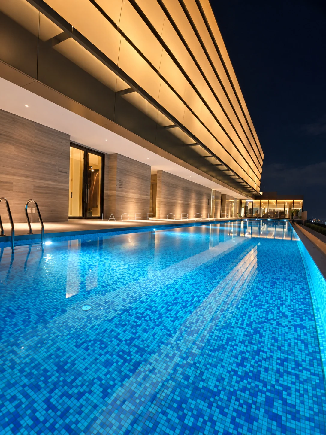 Shared Swimming Pool at Night at Windsor Suites, Pavilion Damansara Heights