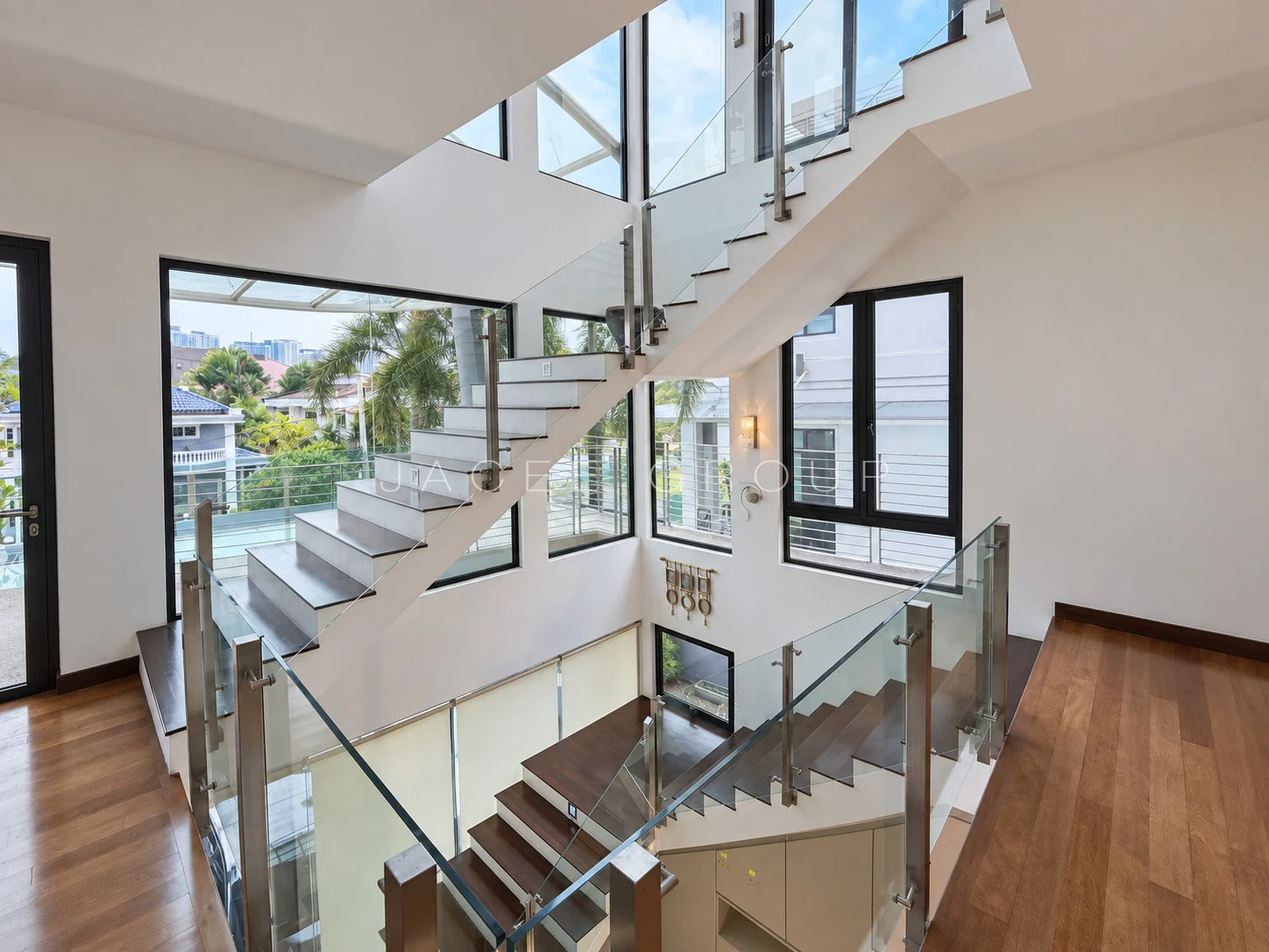 Glass Staircase and Landing at the Damansara Heights modern bungalow