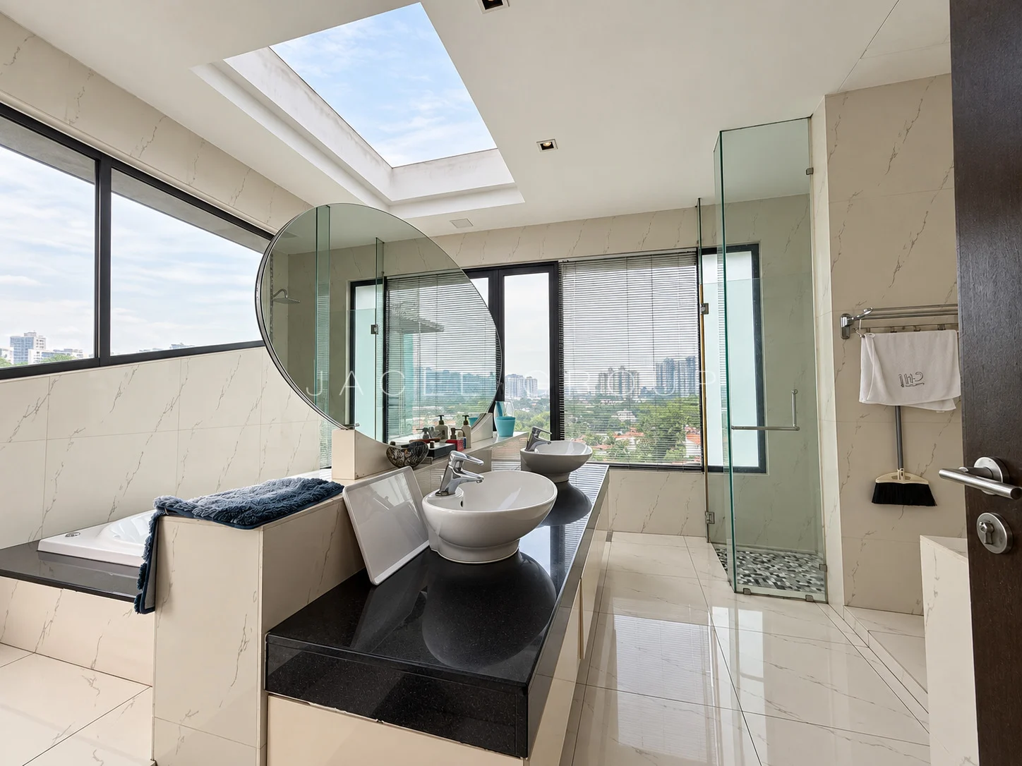 Bathroom Vanity and Skylight at the Damansara Heights modern bungalow