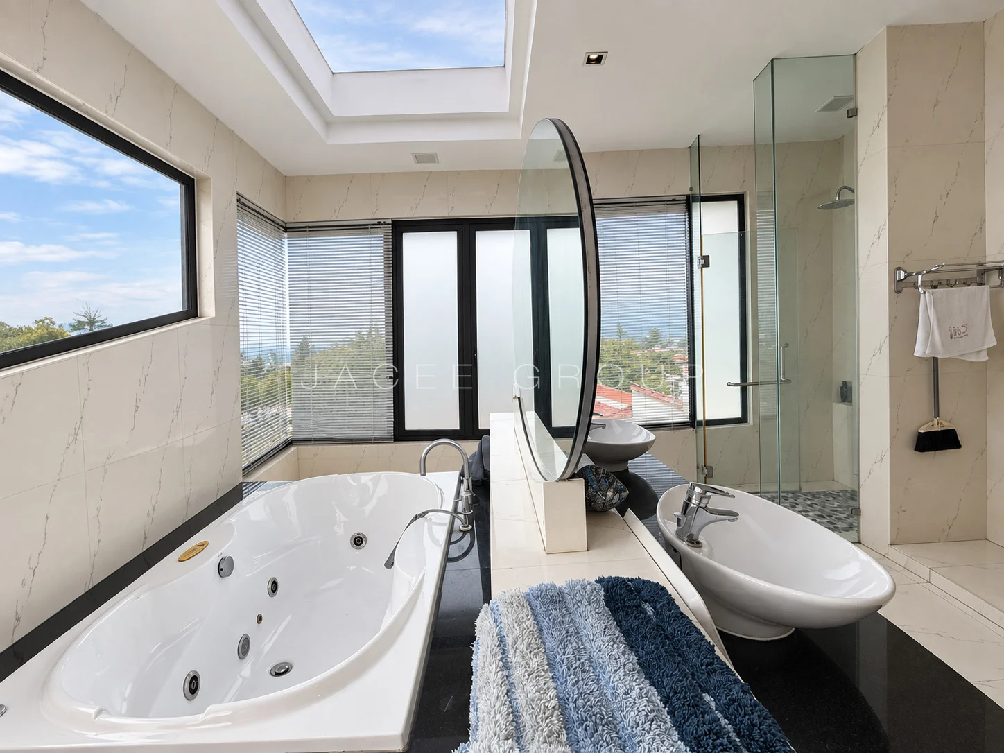 Bathtub and Glass Shower at the Damansara Heights modern bungalow