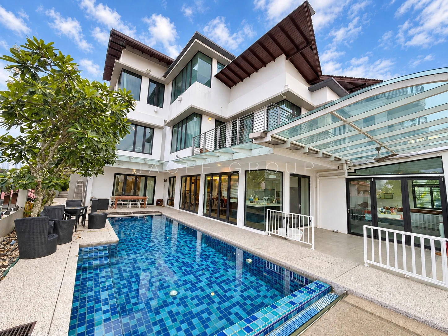 Pool and Front Facade at the Damansara Heights modern bungalow