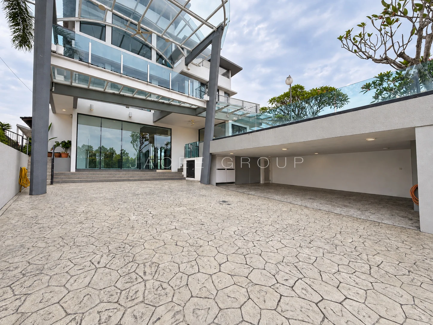 Arrival Driveway and Covered Parking at the Damansara Heights modern bungalow