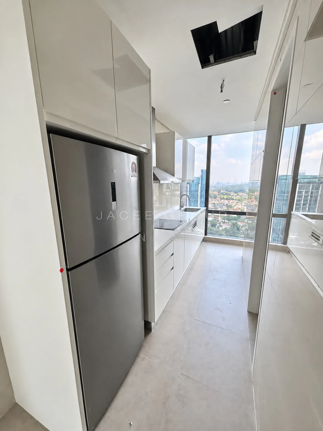 Wet kitchen and refrigerator at Crown Residences Pavilion Damansara Heights, 2803 sq ft home for sale